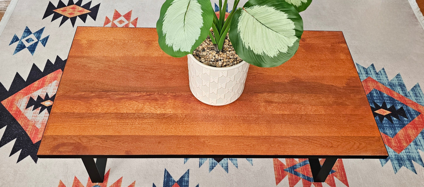 Solid Birch Coffee Table with Black Metal Trapezoid Legs – Natural Dark Honey Finish, 36"x20"