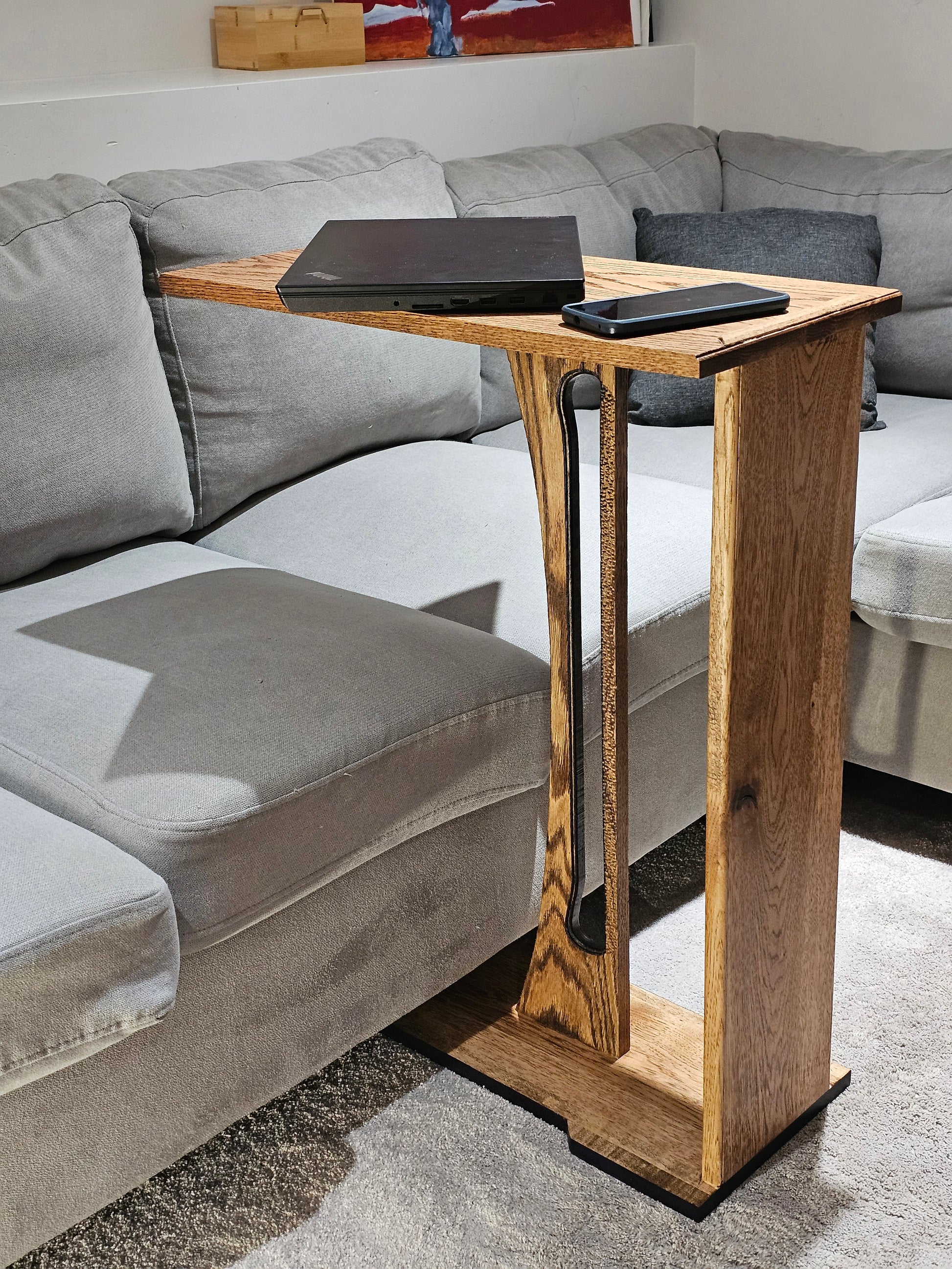 Solid Wood Harp End Table against a gray sofa