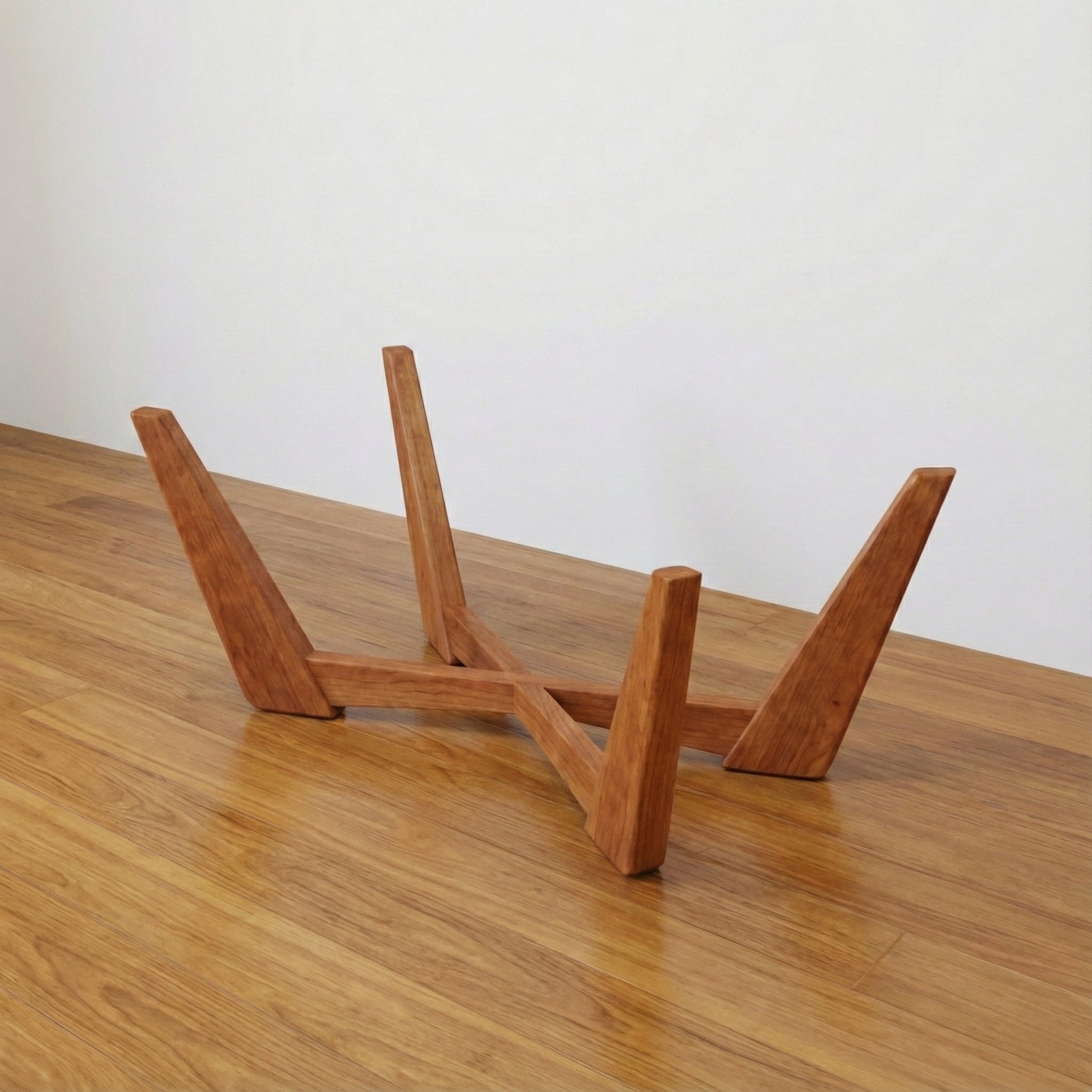 The Nexus solid wood cross-base coffee table mid-century modern, X-leg detail view – Artisan & Sons